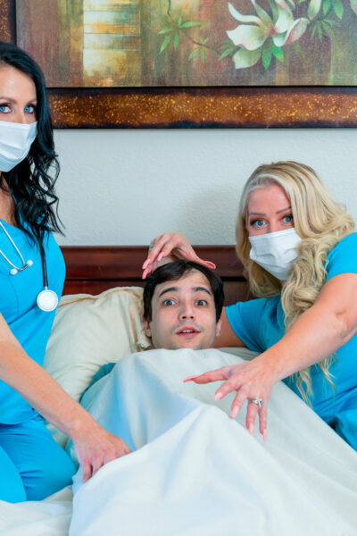 Mature nurses Alura Jenson & Reagan Foxx have a 3some with a young patient Image #1