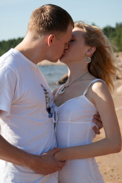 Young girl with naturally blonde hair gets banged on beach by the ocean Image #2