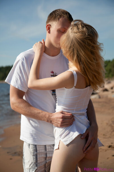 Young girl with naturally blonde hair gets banged on beach by the ocean Image #3