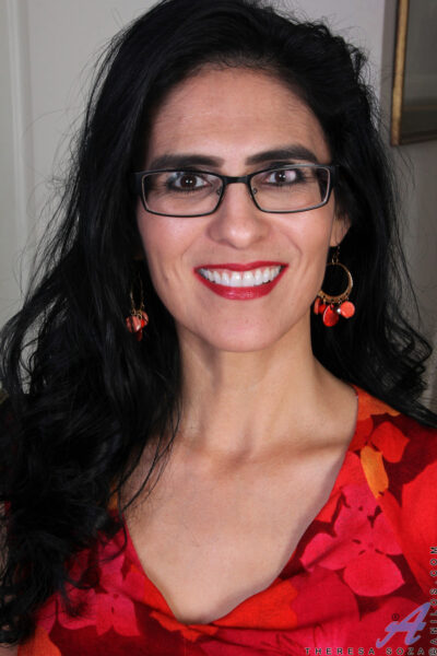 Stunning brunette Theresa Soza showing off her shaved pussy in glasses Image #1