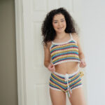 Cute teen Thalia Diaz sports curly hair during a POV fuck on a bed