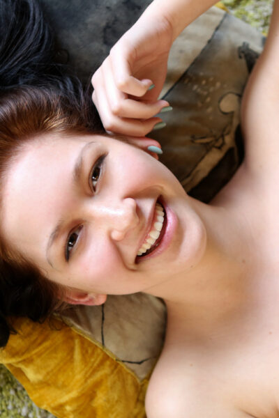 Dark haired teen Lulu Reynolds pleasures her bald twat with a sex toy Image #12