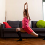 Sweet teen Nicolle gets naked in black knee socks after stretching out