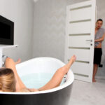 Teen Ivi Rein fucks her stepbro after getting caught masturbating in the tub