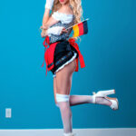 Young girl with long wavy blonde hair Kenzie Reeves has sex in a funky hat