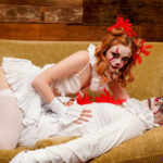 Young redhead Scarlet Skies and her boyfriend have sex in cosplay attire