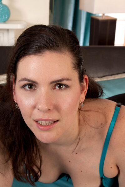 Curvy amateur MILF Sharlyn reveals her hairy crotch and poses in lingerie Image #6