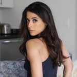 Hot brunette Abbie Maley holds her bare ass during vaginal sex with a big cock