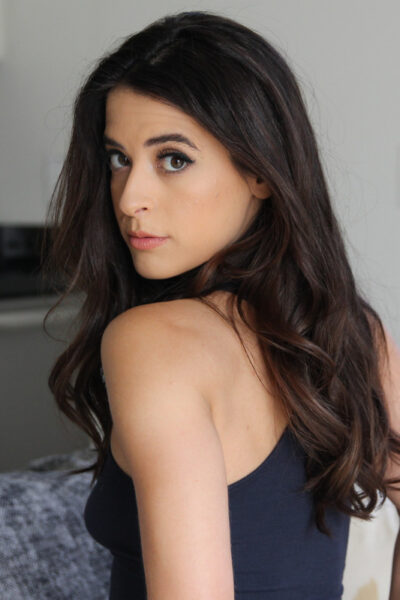 Hot brunette Abbie Maley holds her bare ass during vaginal sex with a big cock Image #1