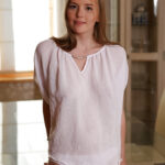 Teen babe Evelina showing off sexy legs and barefeet up close