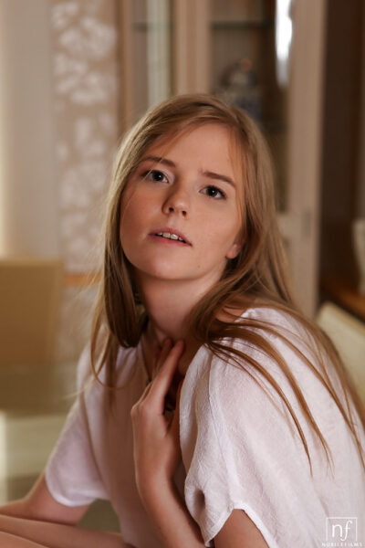 Teen babe Evelina showing off sexy legs and barefeet up close Image #3