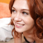 Curly-haired teen Alice Green is playing with her juicy ass!