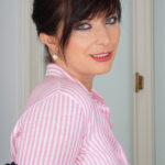 Gorgeous MILF Asha Heart performs a hot striptease & spreads her pussy