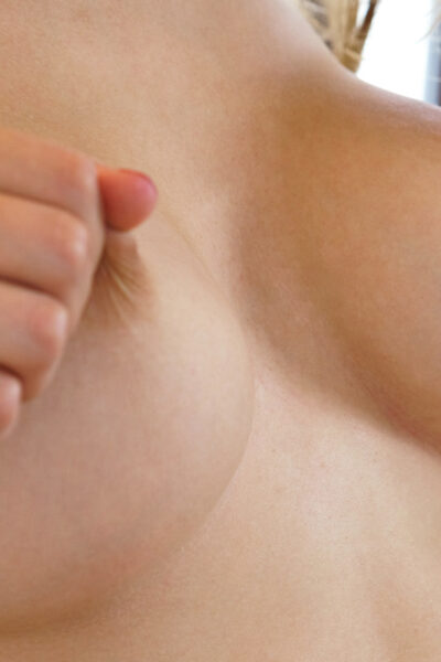 Hot girl plays with her big naturals while seducing her guy friend Image #4