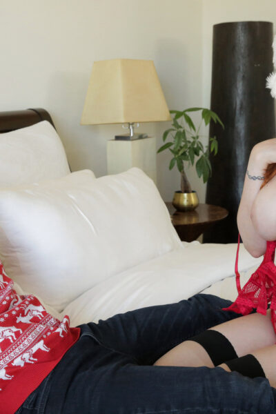 Natural redhead Lauren Phillips displays her big boobs before an Xmas fuck Image #14