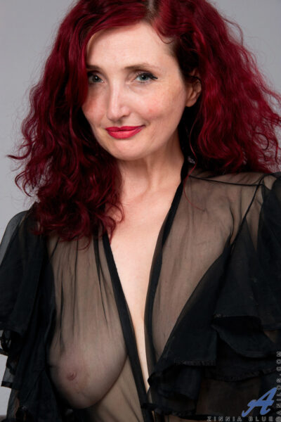 Redheaded MILF Zinnia Blue showing her sweet pussy & cuddling her natural tits Image #2