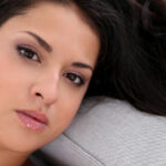 Serbian beauty Coco De Mal bares her medium tits and a big booty in a solo