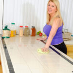 Stunning GILF Venice Knight displays her all natural boobs and toys her pussy